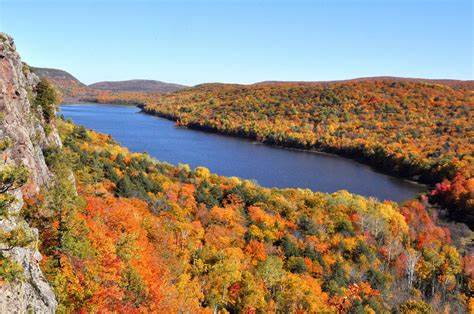 View of the Procupine Mountains and the lake of the clouds from above in fall.