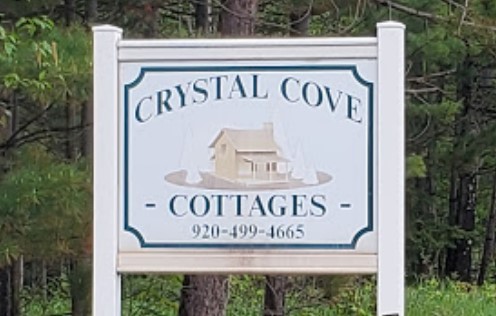 Street sign of Crystal Cove Cottages.