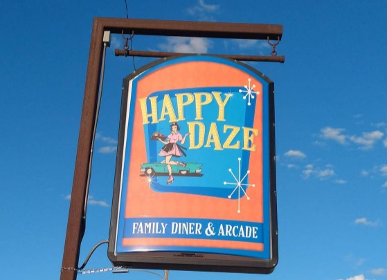 Happy Daze Family Diner & Arcade street sign.