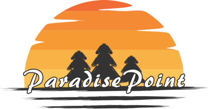 Paradise Point logo - sunset in the background with pine trees in the foreground.