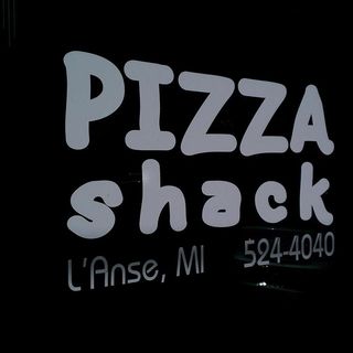 Pizza Shack logo lettering on black background.