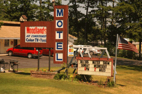 Woodlands Motel street sign