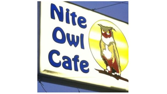 Nite Owl Cafe street sign with Owl in front of the moon.